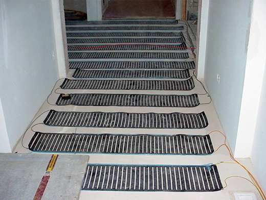 The low-voltage heating panels laid out and wired